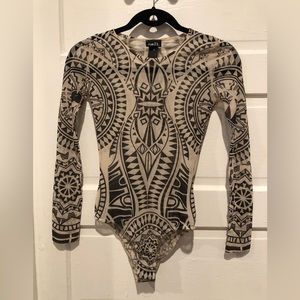 Rue 21, one piece size small, mesh see through material. Very soft.